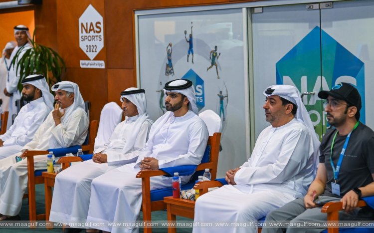 Mansoor bin Mohammed meets players taking part in the Nad Al Sheba Sports Tournament