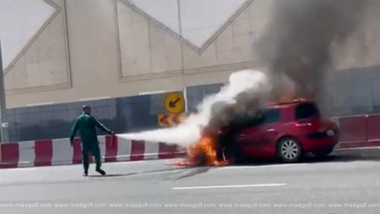 రహదారిపై మంటల్లో చిక్కుకున్న కారు.. భారీగా ట్రాఫిక్ జామ్