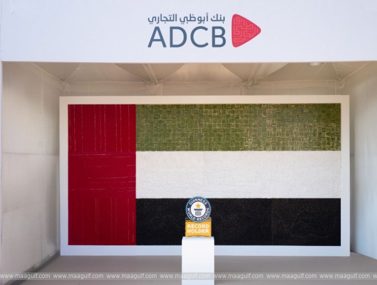 ADCB sets Guinness World Record with largest biodegradable UAE flag