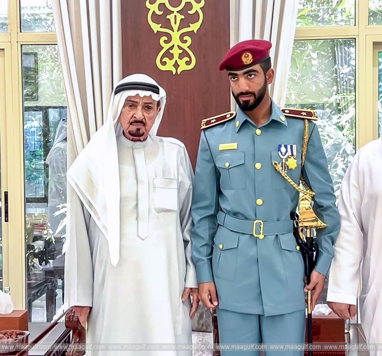 Humaid bin Rashid receives Officer Cadet Obaid Al Kaabi, winner of Sword of Honour from Police College