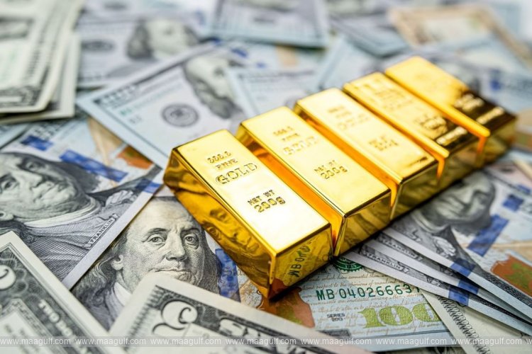 Gold prices drop on firmer dollar
