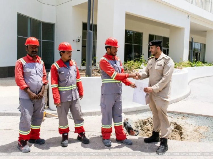 Sharjah Police visits workers on Labor Day