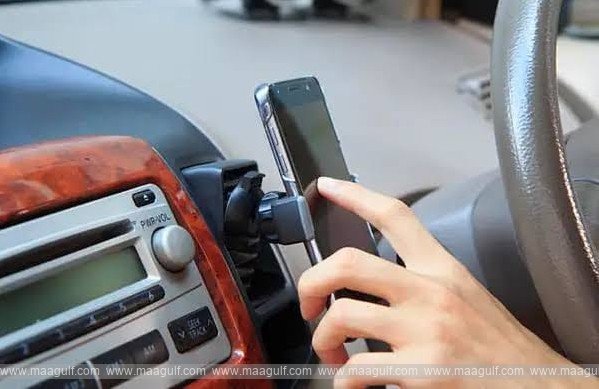 Heavy fine for using mobile phone while driving..