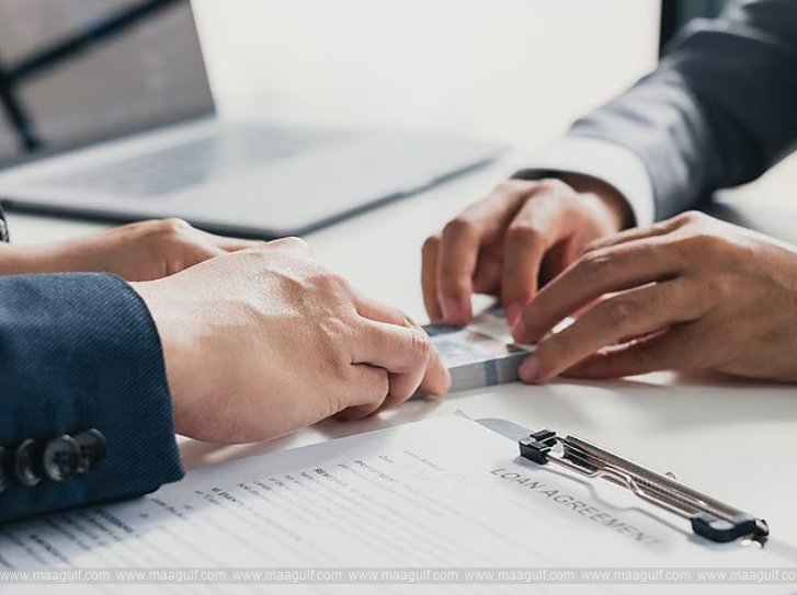 What happens if personal loan payments stop in the UAE?