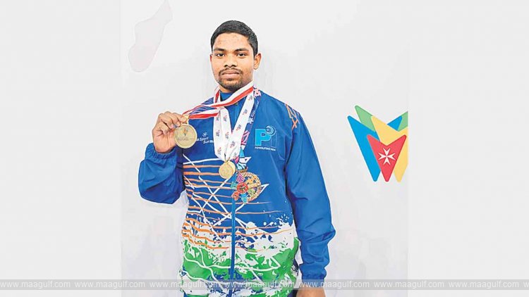 Telangana boy shines in powerlifting..Modem Vamsi wins 4 medals!