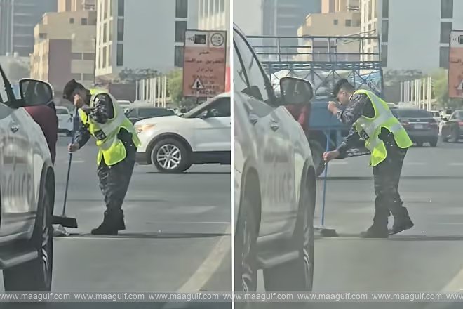 Police officer seen sweeping the road... video goes viral!