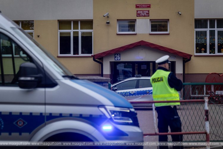 Heavy police presence calms tensions after Poland school attacks